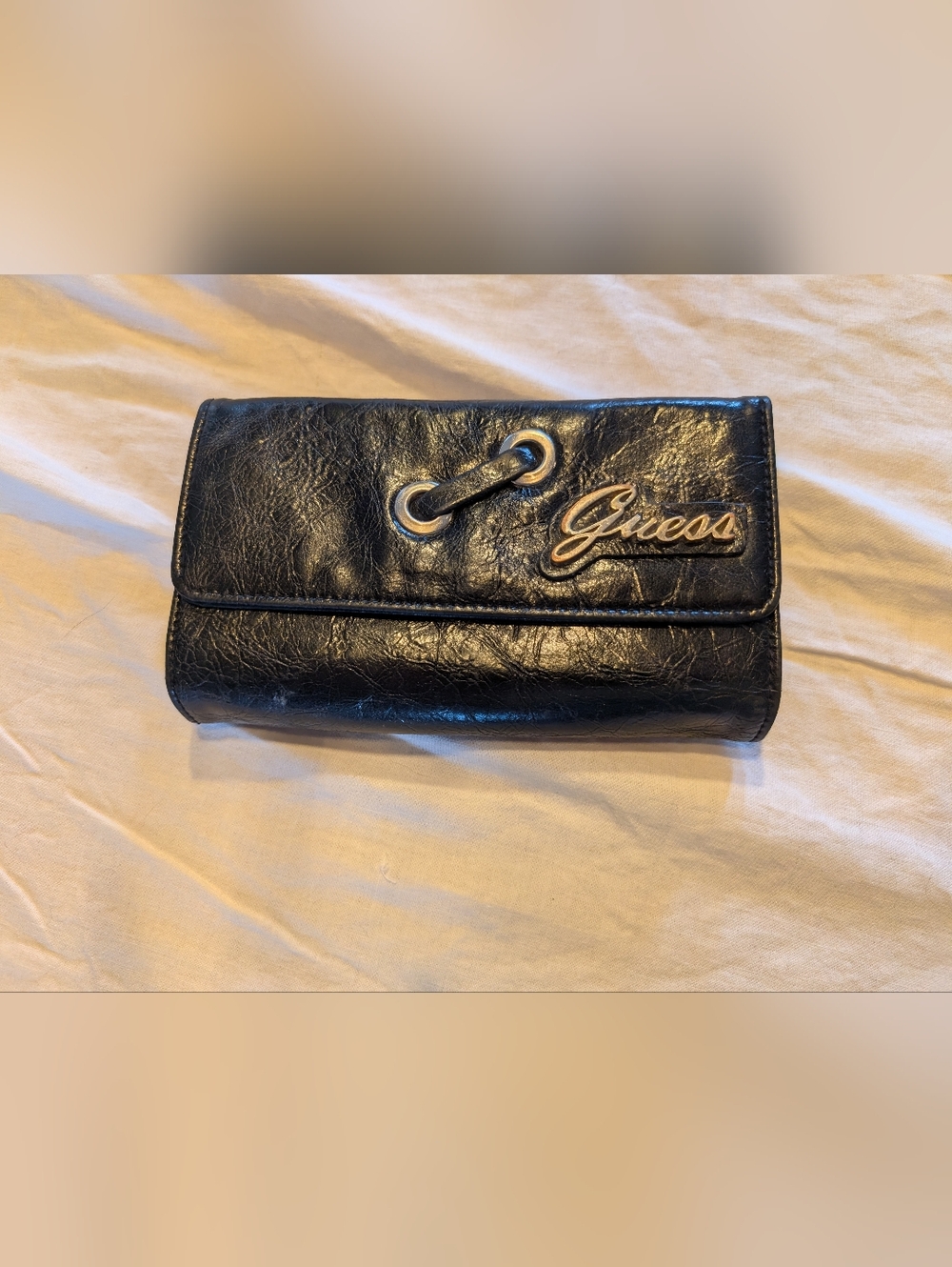 2/20$ GUESS Black False Leather Clutch with Silver Script Logo